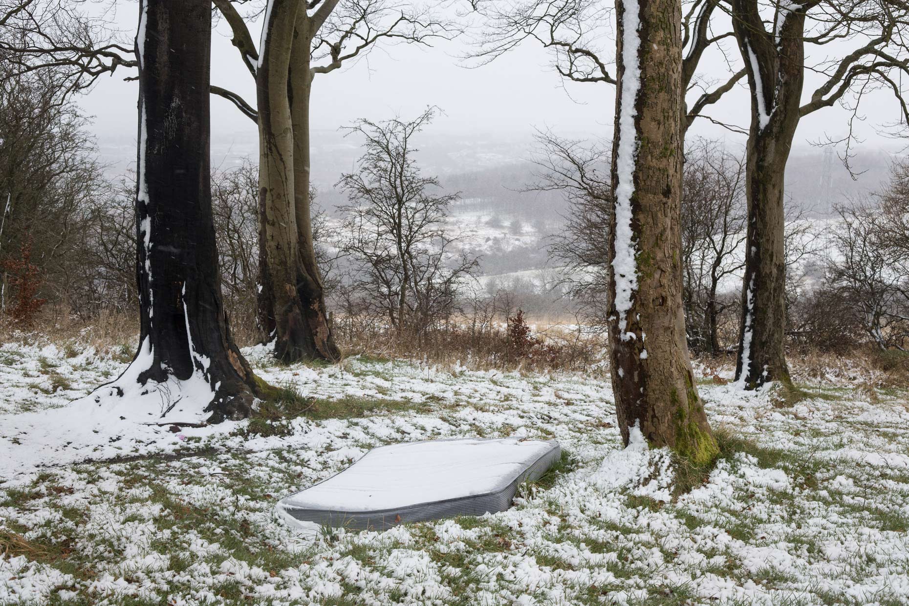 Mattress in the snow on Antonine Wall, Scotland by Glasgow photographer Sutton-Hibbert