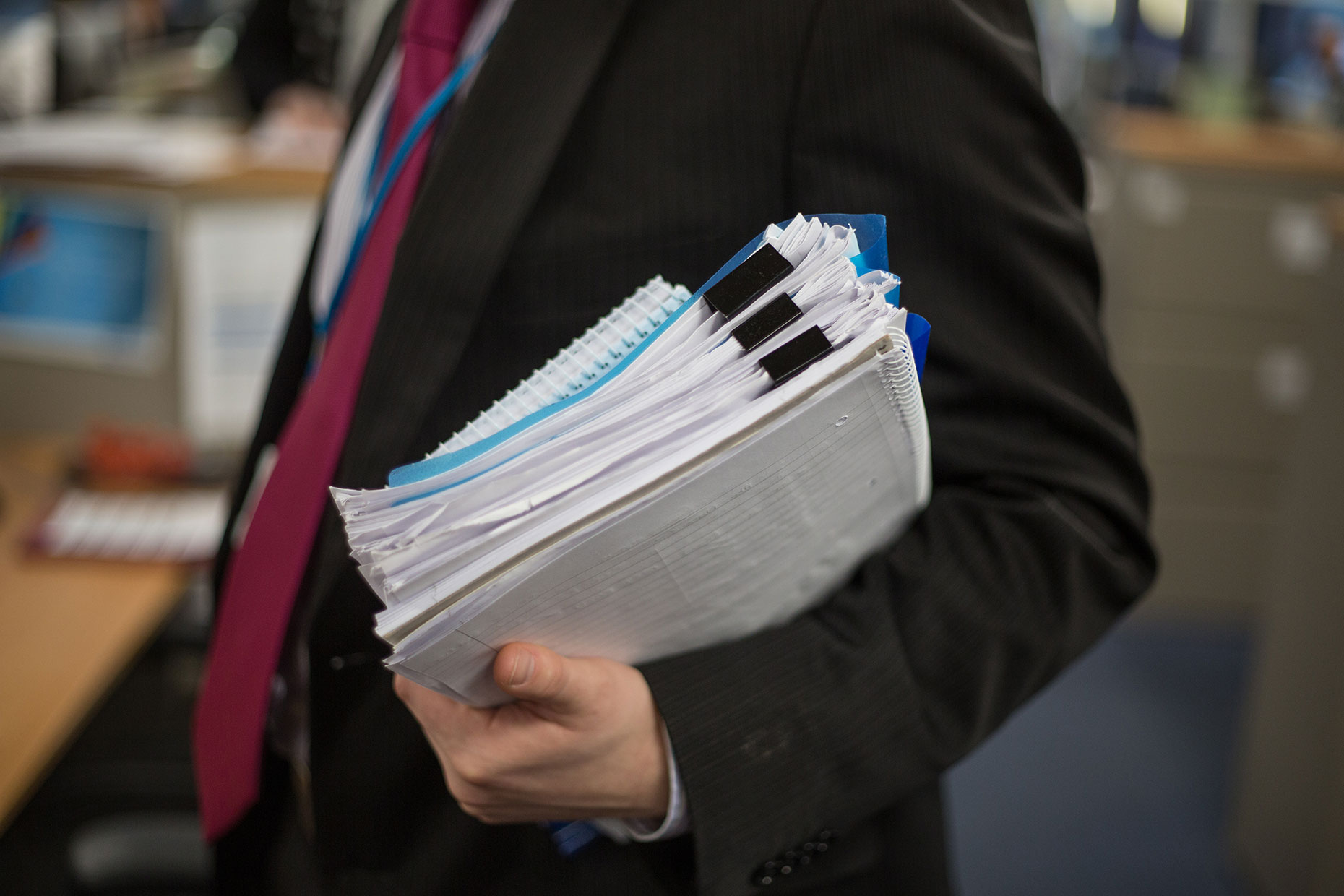 Businessman carried files by Scotland corporate photographer J. Sutton-Hibbert